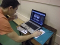 Kevin, qui avait ramene son ordinateur portable afin de pouvoir presenter le site a nos sponsors